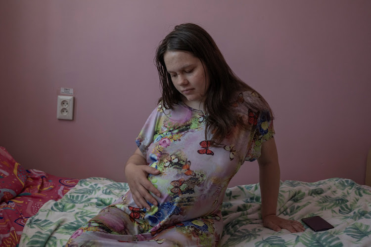 Pregnant Viktoriya Sokolovska, 16, sits inside Pokrovsk maternity hospital, Donetsk region, eastern Ukraine, June 28 2022. She has since given birth to a healthy daughter, Emilia. Picture: REUTERS/MARKO DJURICA