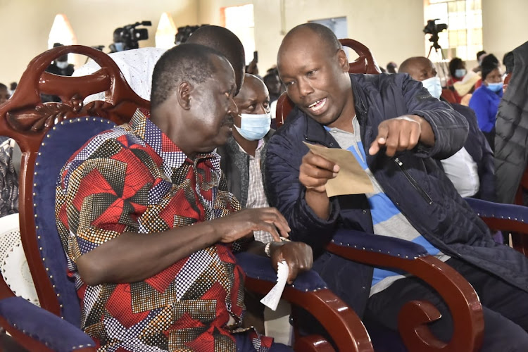 ODM leader Raila Odinga and Nakuru Governor Lee Kinyanjui during a church service in the county, Sunday January 23, 2022.