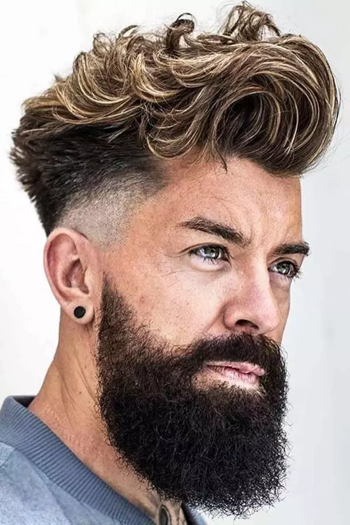 Full picture of a guy rocking his high taper waves