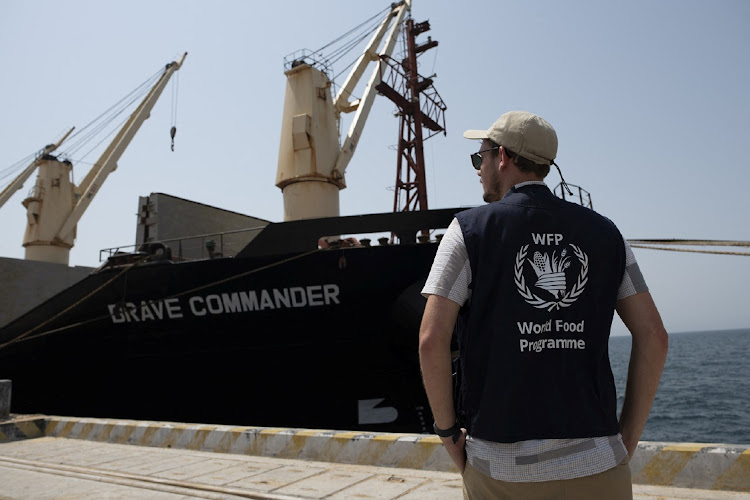 A World Food Programme staff looks on as the MV Brave Commander carrying wheat grain from Yuzhny Port in Ukraine to the drought-stricken Horn of Africa docks at port of Djibouti in Djibouti, August 30 2022. Picture: REUTERS/WORLD FOOD PROGRAMME