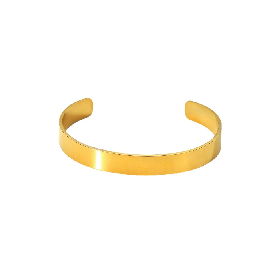 Nouveau bracelet large et lisse en acier inoxydable doré 18 carats. Un bijou élégant et résistant pour un style intemporel.