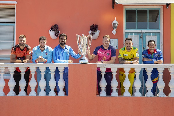 Captains of the SA20 franchises, including Faf du Plessis in yellow, pose with the trophy ahead of the start of the tournament.