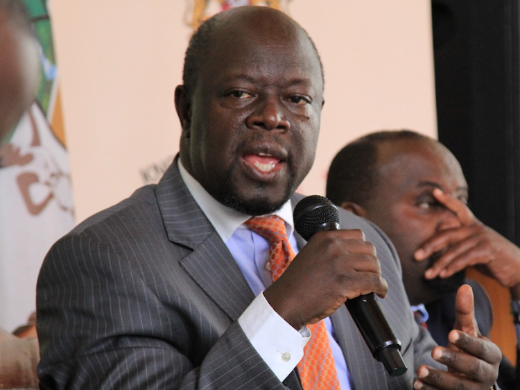 Governor Patrick Khaemba speaking at a forum in Kitale.