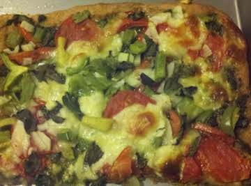 Pizza - Pesto, Basil, Onion, Green Pepper, Garlic, and Garden Fresh Tomatoes