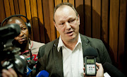 A file photo of Wayne Duvenage speaking to the media at the ruling of the North Gauteng High Court to dismiss an application to scrap e-tolls in Gauteng on December 13, 2012 in Pretoria, South Africa.