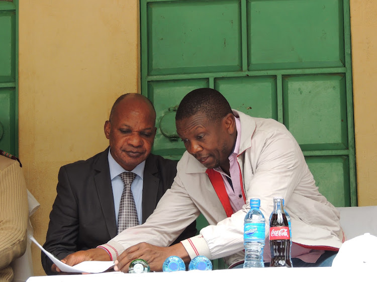 PS Nelson Marwa with Kuria East MP Marwa Kitayama at Kegonga during a past function