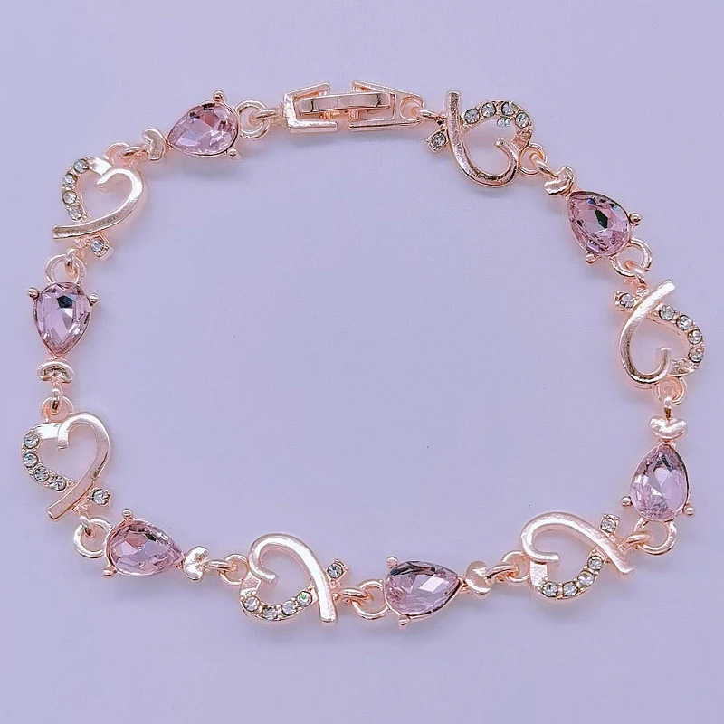 Holle elegante damesarmband met bloemmotief en strass, perfect voor een chique en vrouwelijke uitstraling.