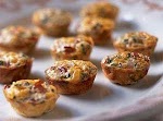 Mini Frittatas with Ham and Cheese was pinched from <a href="http://www.myrecipes.com/recipe/mini-frittatas-with-ham-cheese-10000000521726/" target="_blank">www.myrecipes.com.</a>