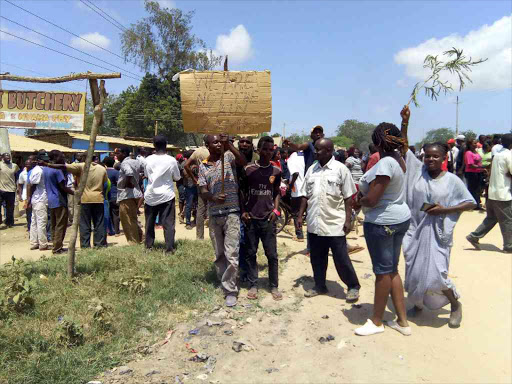 Residents of Hindi town protest the killings of four men by suspected al Shabaab in Silini and Bobo villages. /CHETI PRAXIDES