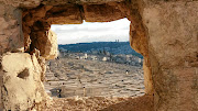 A glimpse of the Mount of Olives cemetery where 70,000 Jewish people are buried. It is believed by some that those buried here will rise first on the day of resurrection because of the proximity of the cemetery to the holy city. 