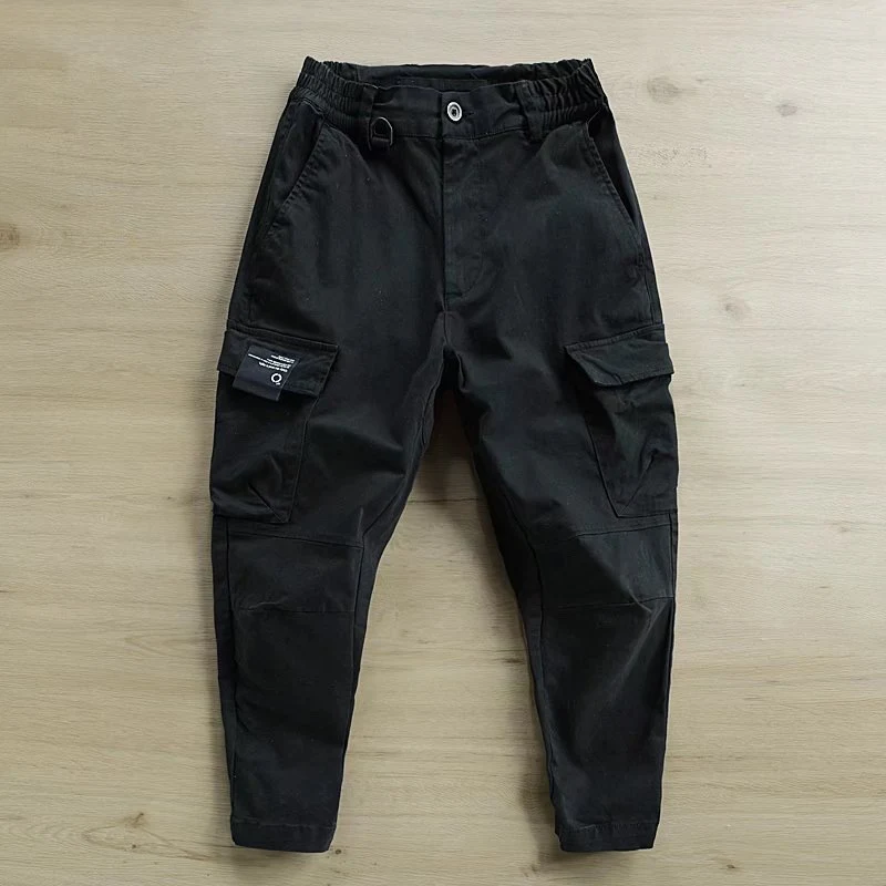 Pantalones casuales cortos de hip hop sueltos con lazo en el tobillo. Estilo holgado y moderno para un look urbano y cómodo ideal.