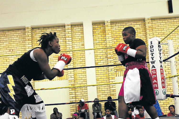 SA female welterweight champion Rita "Shot Gun" Mrwebi (right) beat Mapule Ngubane.