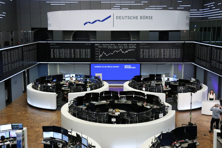 A TV presenter gets ready for the daily reporting from the floor of the German share price index DAX at the stock exchange in Frankfurt, Germany. Picture: REUTERS