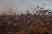 Destroyed shelters following a fire at the Moria camp for refugees and migrants on the island of Lesbos, Greece, September 9, 2020. 
