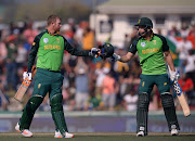 Heinrich Klaasen of South Africa celebrates his century with teammate David Miller during the 2020 Momentum One Day International Series game between South Africa and Australia at Boland Park in Paarl on 29 February 2020.