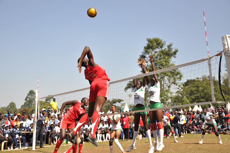 - Kesogon Girls Vivian Vugutza soars in the air as she seeks to attack against Daisy Chepngetich of Kwanzathe during their final match at Kakamega High School grounds.