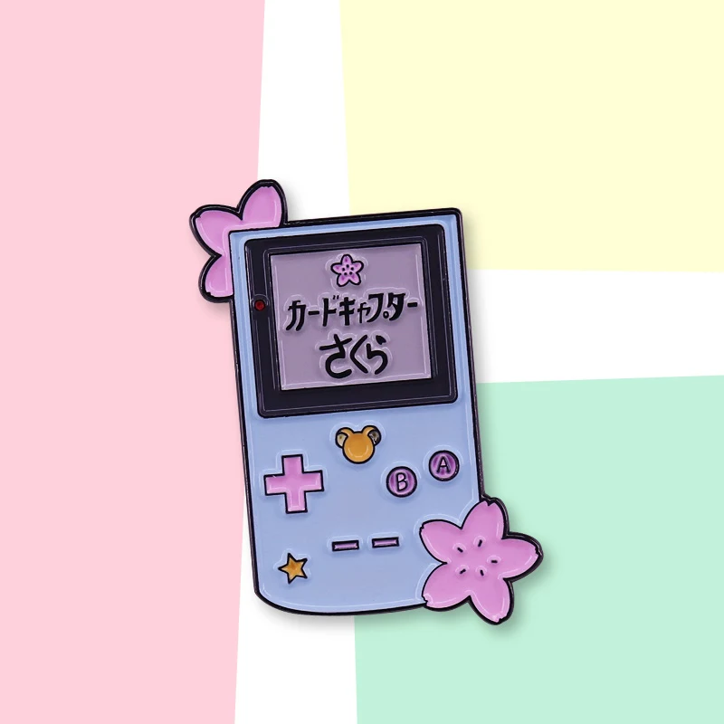 Broche de consola de juegos de dibujos animados más vendido ¡Un accesorio divertido y nostálgico para fans! Luce tu pasión por los videojuegos con estilo.