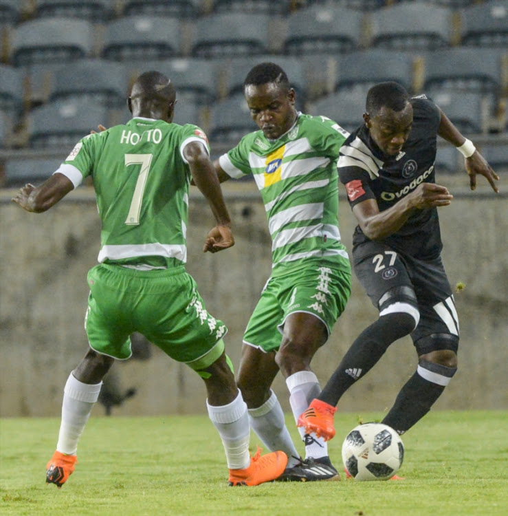 Justin Shonga of Orlando Pirates and Ronald Pfumbidzai of Bloemfontein Celtic during the Absa Premiership match between Orlando Pirates and Bloemfontein Celtic at Orlando Stadium on April 04, 2018 in Johannesburg, South Africa.