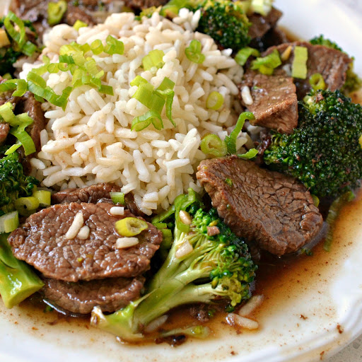 This family friendly Easy Beef and Broccoli is all made in one skillet and is on the table in less than thirty minutes.  Crisp stir fried broccoli is paired with tender cuts of beef in a tasty salty sweet Asian beef sauce. 