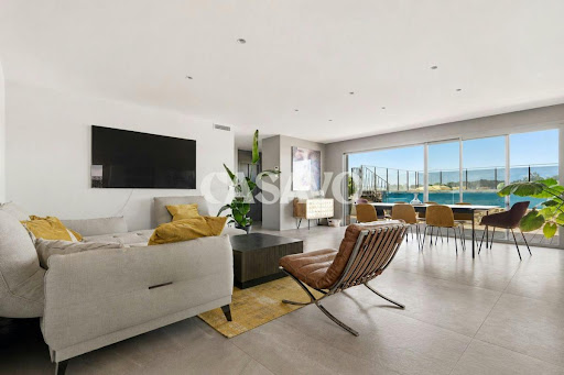 Buy this luxury apartment / penthouse in Eguilles (13510) - Neighborhood Campagne Ouest-Zone Industrielle-Rastel-Ponteils - Modern living room with panoramic sea view