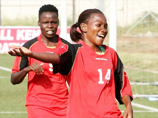 Harambee Starlets Nedy Atieno and Esse Akida celebrate against Uganda’s Falcons during a past International friendly