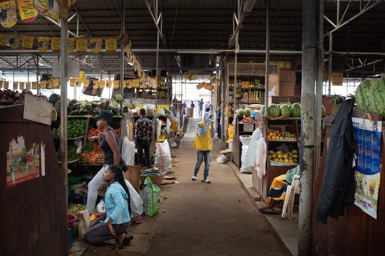 There are fewer customers at the Kaveza modern market as only essential shops are open during the lockdown in Kigali, Rwanda.