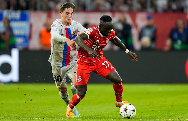 Gavi of Barcelona challenges Sadio Mane of Bayern Munich in the Uefa Champions League Group C match at Allianz Arena in Munich on September 13 2022.