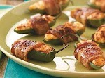 Sweet & Spicy Jalapeno Poppers Recipe was pinched from <a href="http://www.tasteofhome.com/Recipes/Sweet---Spicy-Jalapeno-Poppers" target="_blank">www.tasteofhome.com.</a>