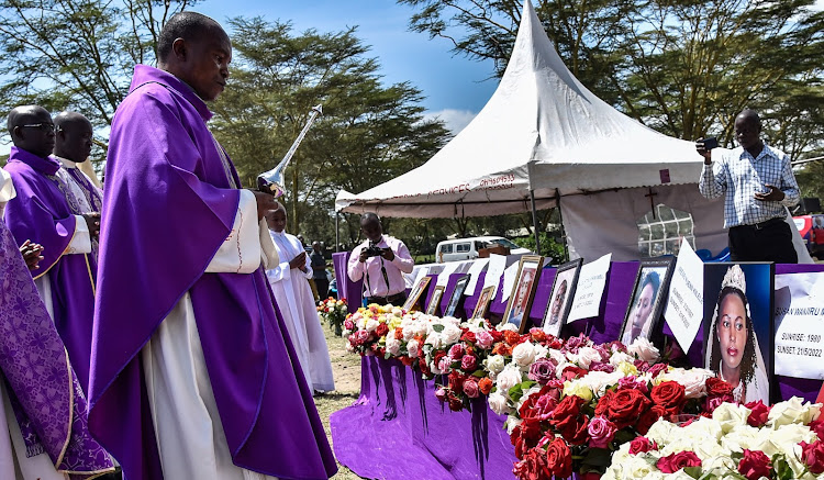 Catholic priests pray for the souls of nine victims who died in a road accident in Mai Mahiu during a requiem mass at Kongoni trading centre in Naivasha on Thursday May 26, 2022