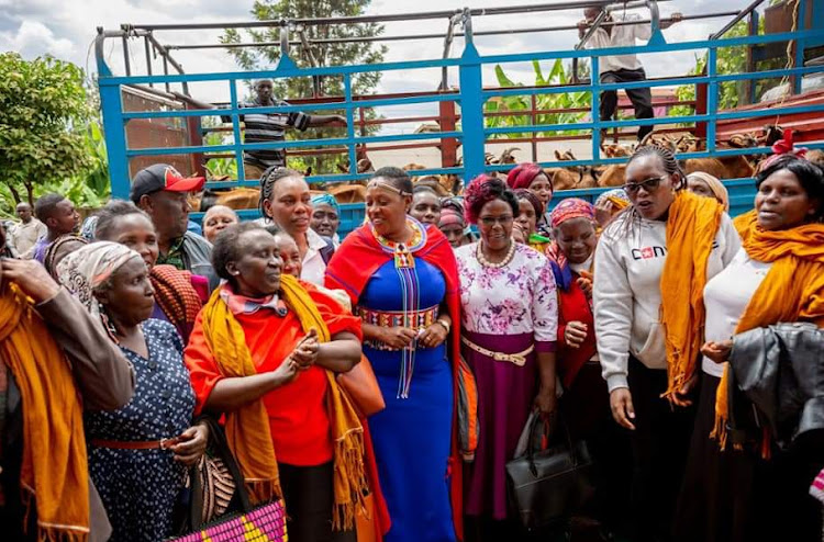 Murang'a Woman Representative Sabina Chege with women at Maragi Catholic Church on July 16, 2022.