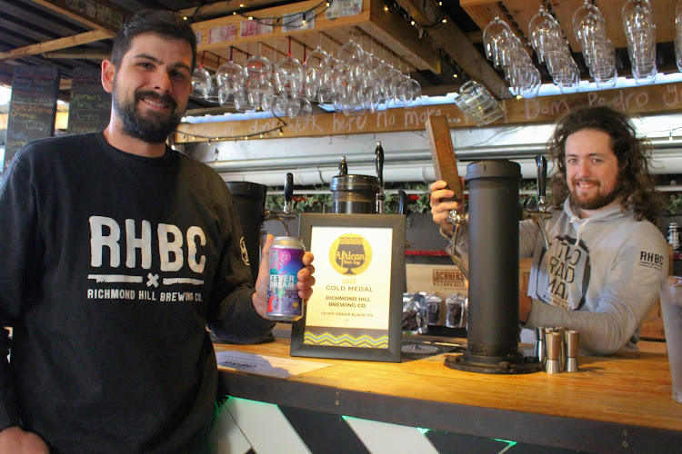 Richmond Hill Brewing Company received a gold award at the African Beer Cup in June. Owner and brewer Niall Cook, left, and fellow brewer Zak Hurlow invite the public to try some of their award-winning beers