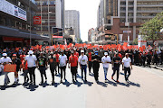 Other parties join the EFF and together they march through the  streets of Pretoria.