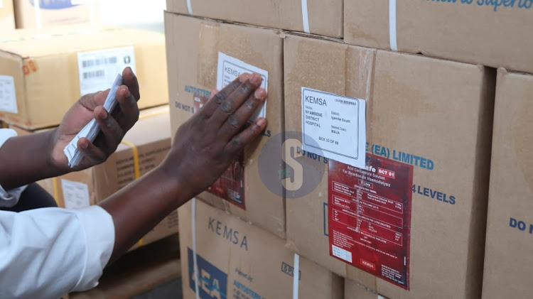 Fine picker consolidation staff labels the products for efficient delivery to the respective counties on April 4, 2023.