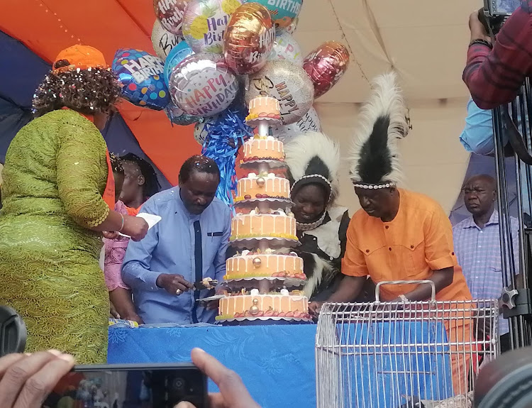 Wiper Party leader Kalonzo (left) Kisii Governor Simba Arati (partially hidden) and ODM leader Raila Odinga during a function to mark Arati's birthday in Nyamache, Kisii (IMAGE BY MAGATI OBEBO)