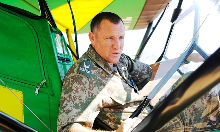 Kruger National Park section ranger Andrew Desmet prepares the Bathawk anti-poaching aircraft for a mission.