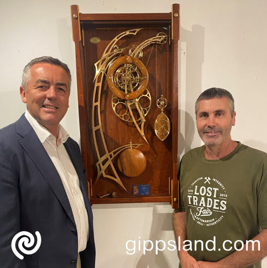 Mr Chester with Bairnsdale wood-worker Trevor Herbstreit whose �Scimitar Skeleton Clock� won an overall prize