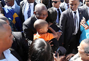 President Cyril Ramaphosa with Premier Helen Zille and Minister of Police Bheki Cele interacts with the community of Hanover Park in Cape Town ahead of the launch of the SAPS Anti Gang Unit in the Western Cape on November 02 2018