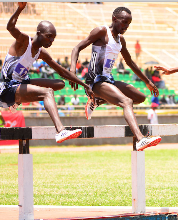 Abraham Kibiwott leads Leonard Bett in a recent 3,000m steeplechase race