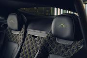 On the inside, Pikes Peak embroidery to the seat headrests in Radium stitching add to the sporty appeal.