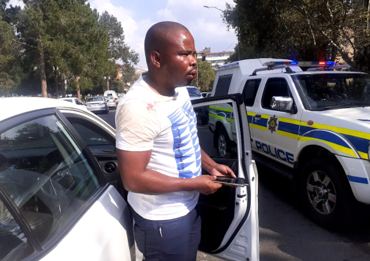 A police officer travelling in an unmarked white Toyota Corolla was allegedly attacked by protesting e-hailers who mistook him for an e-hailing service provider in Pretoria.