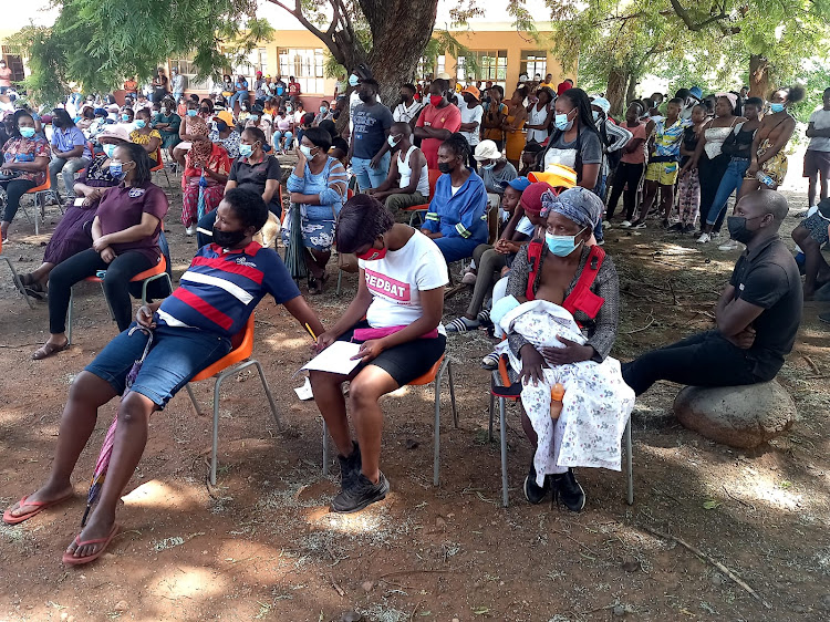 Parents and concerned residents gathered outside Tirelong Secondary School on Monday to meet the education MEC.