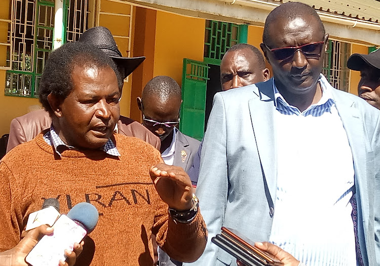 Farmers' representative David Kiberenge and Moiben MP Silas Tiren speaking in Eldoret after a meeting on November 17.