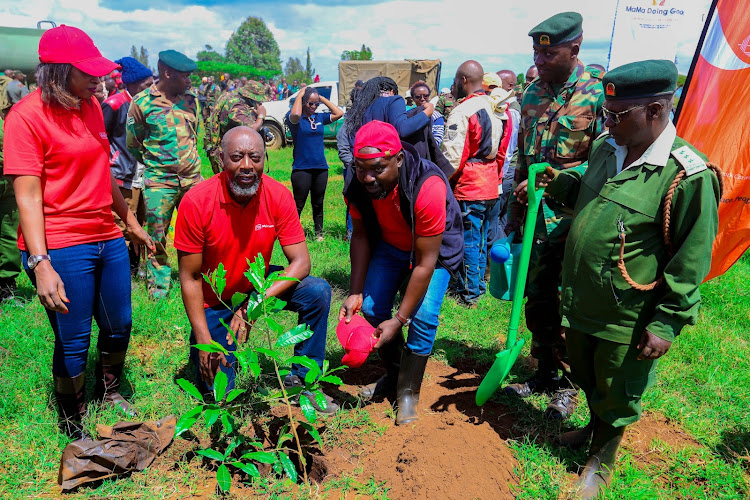 Minet CEO and also the chairman Joe Onsando after planting a tree at Matathia forest in Kiambu county.