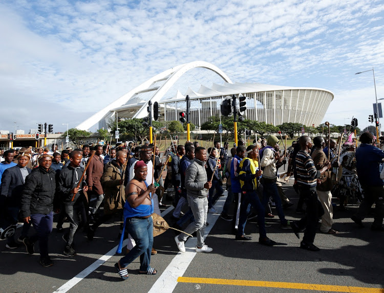 Supporters of King Misuzulu kaZwelithini arrive ahead of the final ceremony of his coronation at Moses Mabhida Stadium in Durban on October 29 2022.