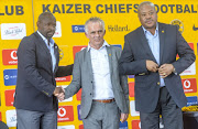 Kaizer Chiefs' head coach Steve Komphela (L) and Football manager Bobby Motaung (R) introduce the new technical advisor Rob Hutting (M) to the media during the club's media briefing at Chiefs Village on January 10, 2018 in Johannesburg, South Africa. 