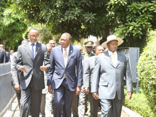 Presidents Paul Kagame (Rwanda), Uhuru Kenyatta (Kenyatta) and Yoweri Museveni (Uganda) in Kampala for the 13th Northern Corridor Integration Projects summit, April 23, 2016. Photo/PSCU