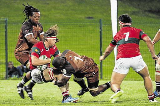 NO QUARTER GIVEN: Bulldogs, seen here in action against Leopards, will take on Hino Valke Picture: SIBONGILE NGALWA