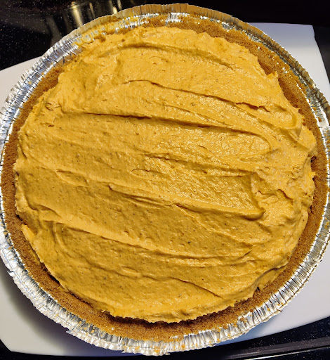 This is the final look of my Thrice Spice Pumpkin Pie (minus decorative whipped cream.) I apply the whipped cream topping just prior to serving. 