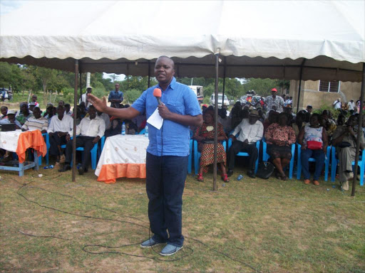 Kitui East MP Nimrod Mbai addresses landowners at Mutito market yesterday /MUSEMBI NZENGU