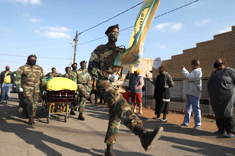 uMkhonto We Sizwe veterans carrying the coffin of the late ANC struggle stalwart Andrew Mlangeni to his home in Dube, Soweto. Picture: THULANI MBELE